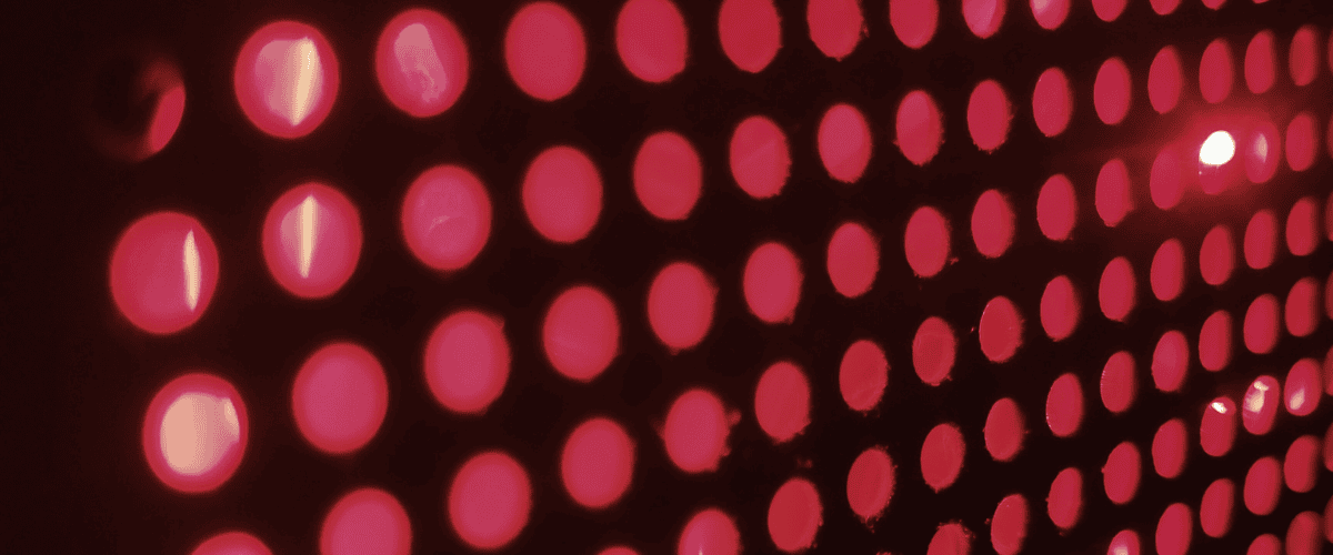 Red Lights Representing BIOMAX 900 Therapy Panel Red lights glowing, symbolizing the advanced BIOMAX 900 therapy panel